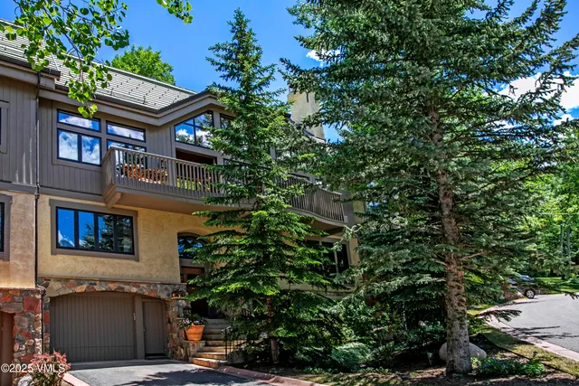 a balcony view with a garden space