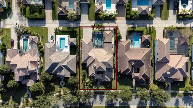 a kitchen with stainless steel appliances granite countertop a stove and white cabinets