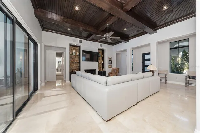 a bedroom with a bed couch and dresser