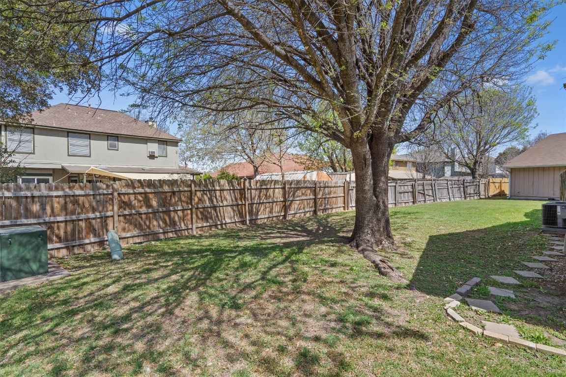 12314 Furrow Cove, Unit A Austin, TX 78753 - Photo 22 of 23 View of fenced backyard