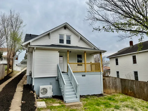 a front view of a house with garage