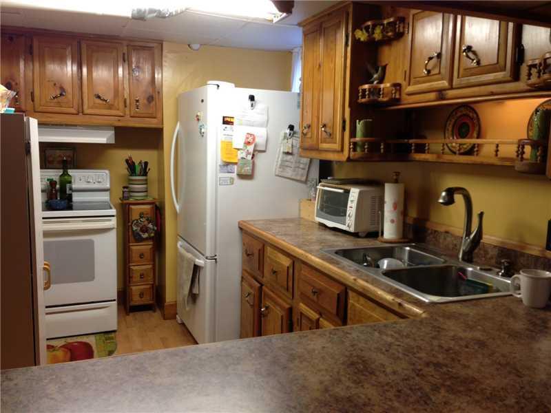 47 Goodwins Acres, Unit ACRES Biddeford, ME 04005 - Photo 16 of 26 Kitchen. Separate lower level...