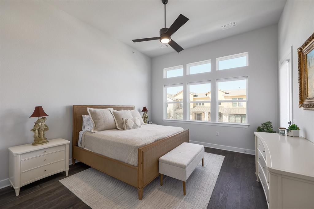 3907 Tilley Street Austin, TX 78723 - Photo 15 of 26 a spacious bedroom with a bed and window