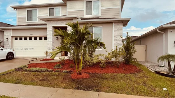 a view of a house with a patio