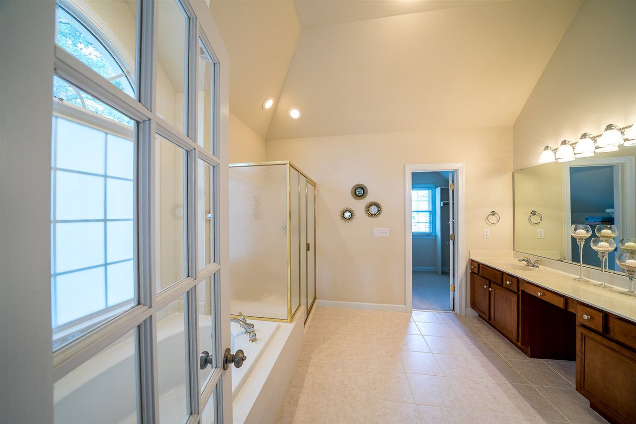 6033 Jones Farm Road Wake Forest, NC 27587 - Photo 25 of 30 Beautiful tile floors and entry into the large walk in closet! Master Bath/Spa