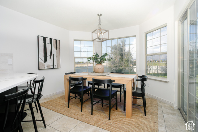 1742 Renaissance Way Springville, UT 84663 - Photo 8 of 23 Bay window dining area with multiple picture windows, a sliding glass door, and tiled flooring