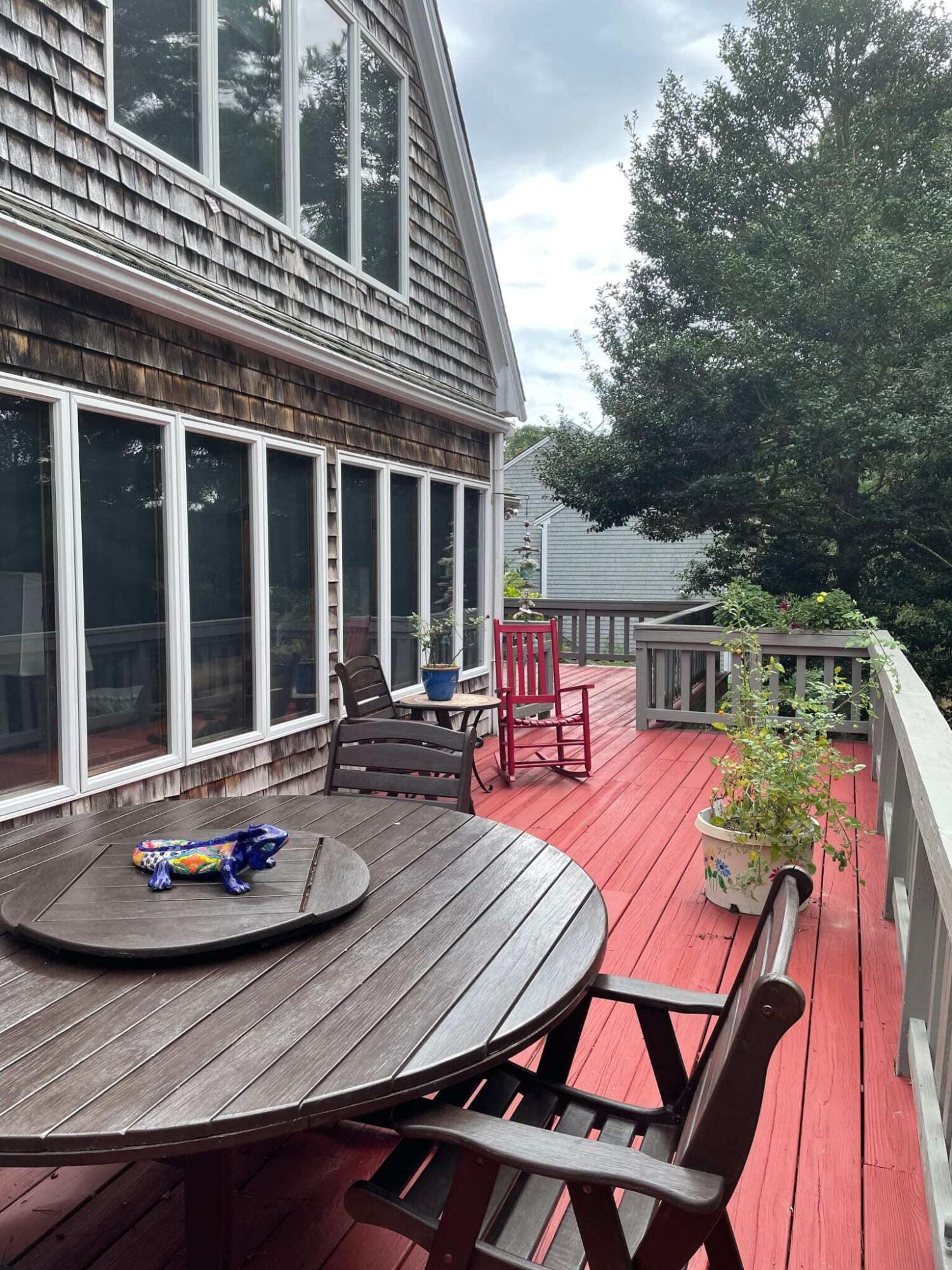 31 Babbling Brook Road Centerville, MA 02632 - Photo 4 of 38 a view of a patio with furniture
