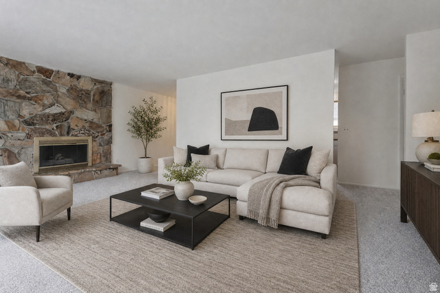 1722 Kimsbrough Road Sandy, UT 84092 - Photo 6 of 29 Living area featuring a stone accent wall with an integrated fireplace, light-toned carpeting, and a neutral color palette