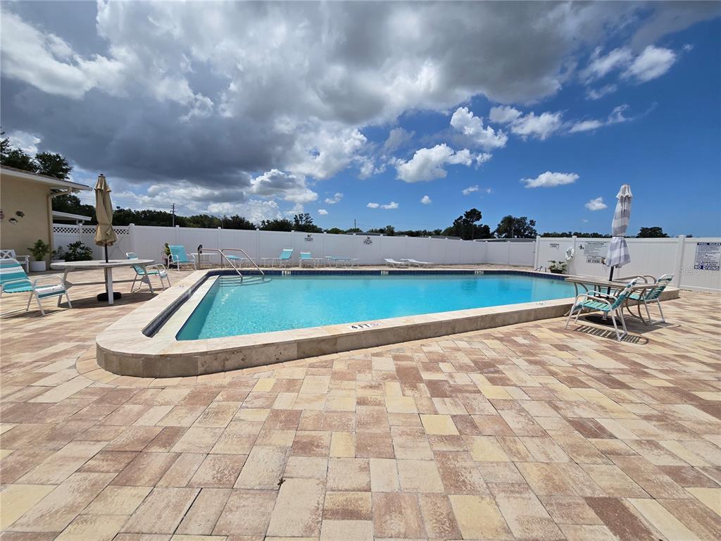 5619 Bayshore Road, Unit 435 Palmetto, FL 34221 - Photo 51 of 56 a view of a terrace with sitting area
