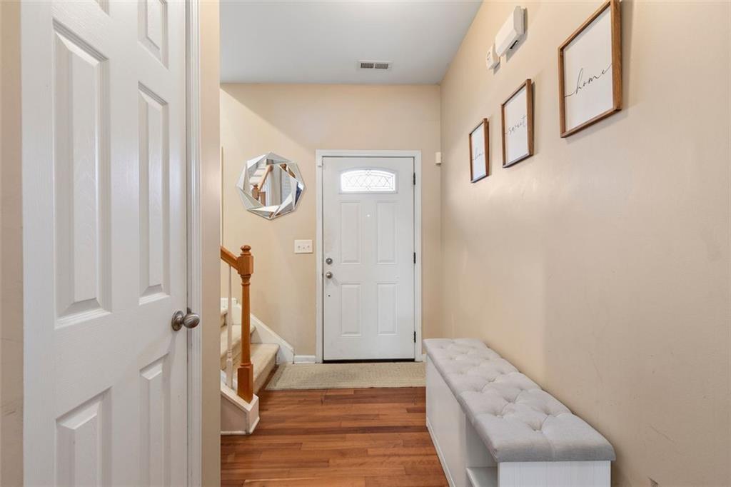 2555 Flat Shoals Road, Unit 5 Atlanta, GA 30349 - Photo 7 of 24 a view of an entryway with wooden floor