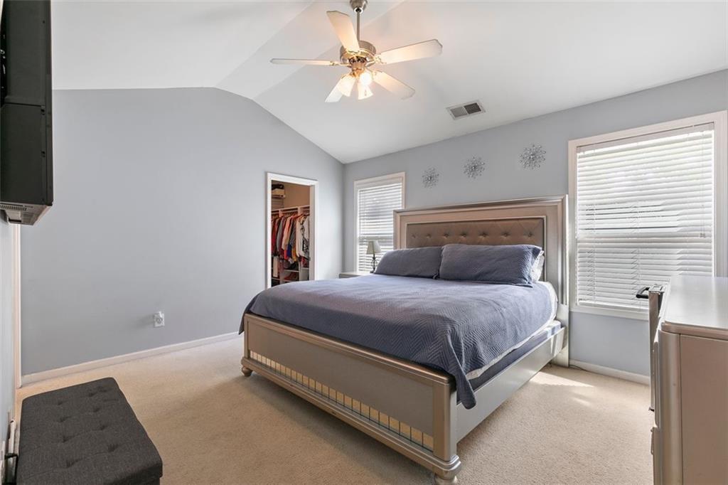 2555 Flat Shoals Road, Unit 5 Atlanta, GA 30349 - Photo 8 of 24 a bedroom with a bed and window