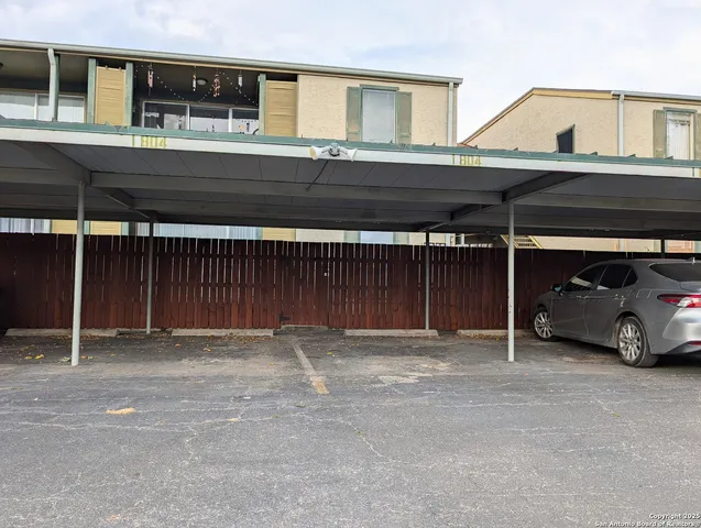 a car parked in front of a house