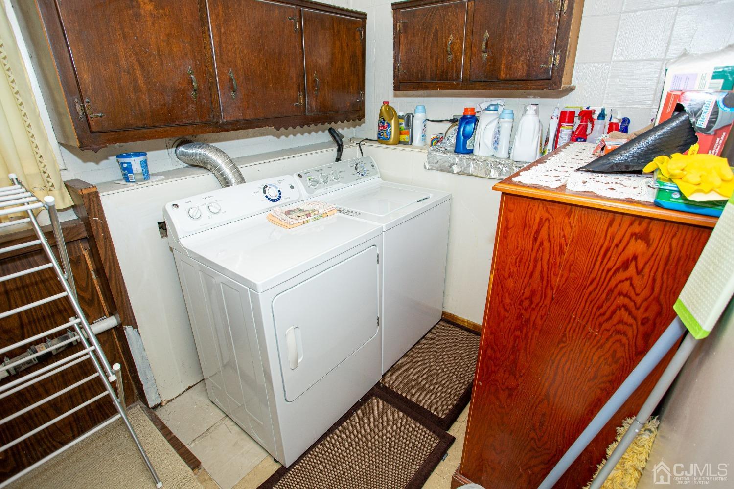 18 Westminster Road Colonia, NJ 07067 - Photo 29 of 36 a utility room with dryer and washer