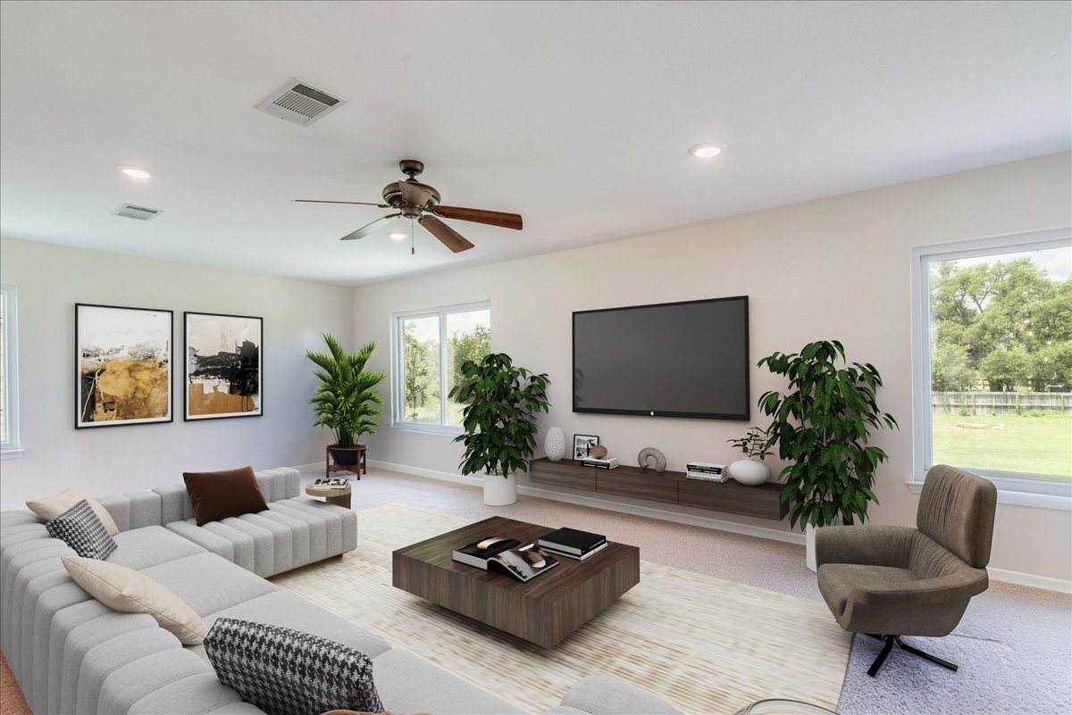 200 South Prairie Lane Georgetown, TX 78633 - Photo 3 of 28 a living room with furniture and a flat screen tv