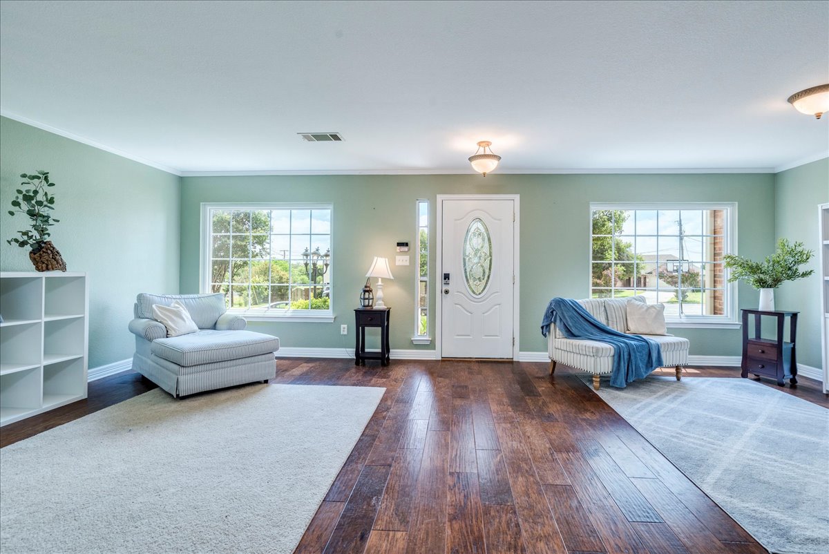 200 South Prairie Lane Georgetown, TX 78633 - Photo 4 of 28 a living room with furniture and a large window