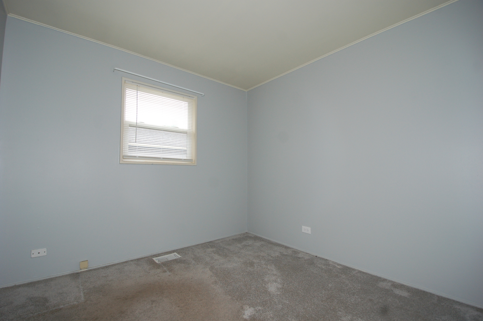 2713 Wilke Road Rolling Meadows, IL 60008 - Photo 11 of 14 an empty room with a window