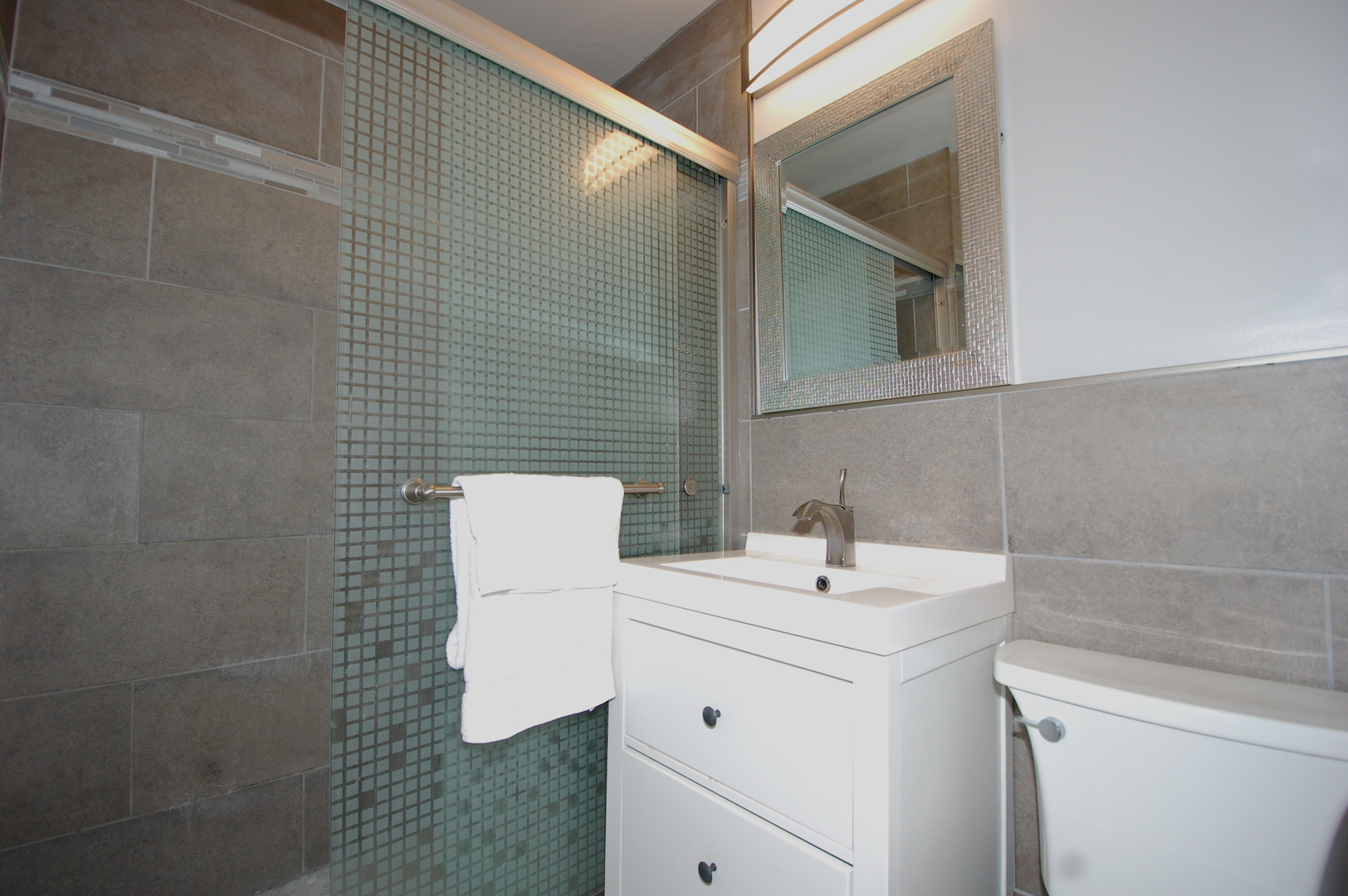 2713 Wilke Road Rolling Meadows, IL 60008 - Photo 7 of 14 a bathroom with a sink toilet and mirror