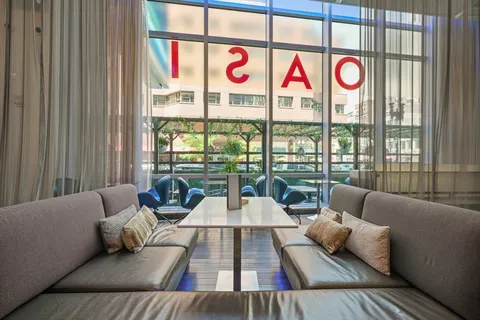 a view of a street with cars