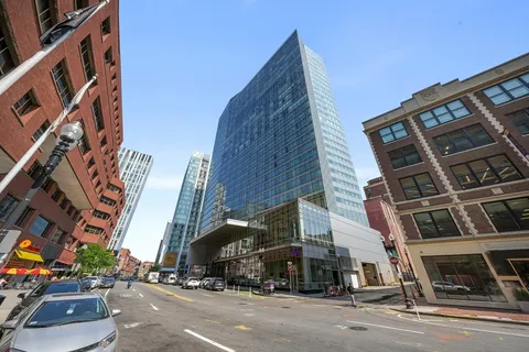 a view of a building with a street