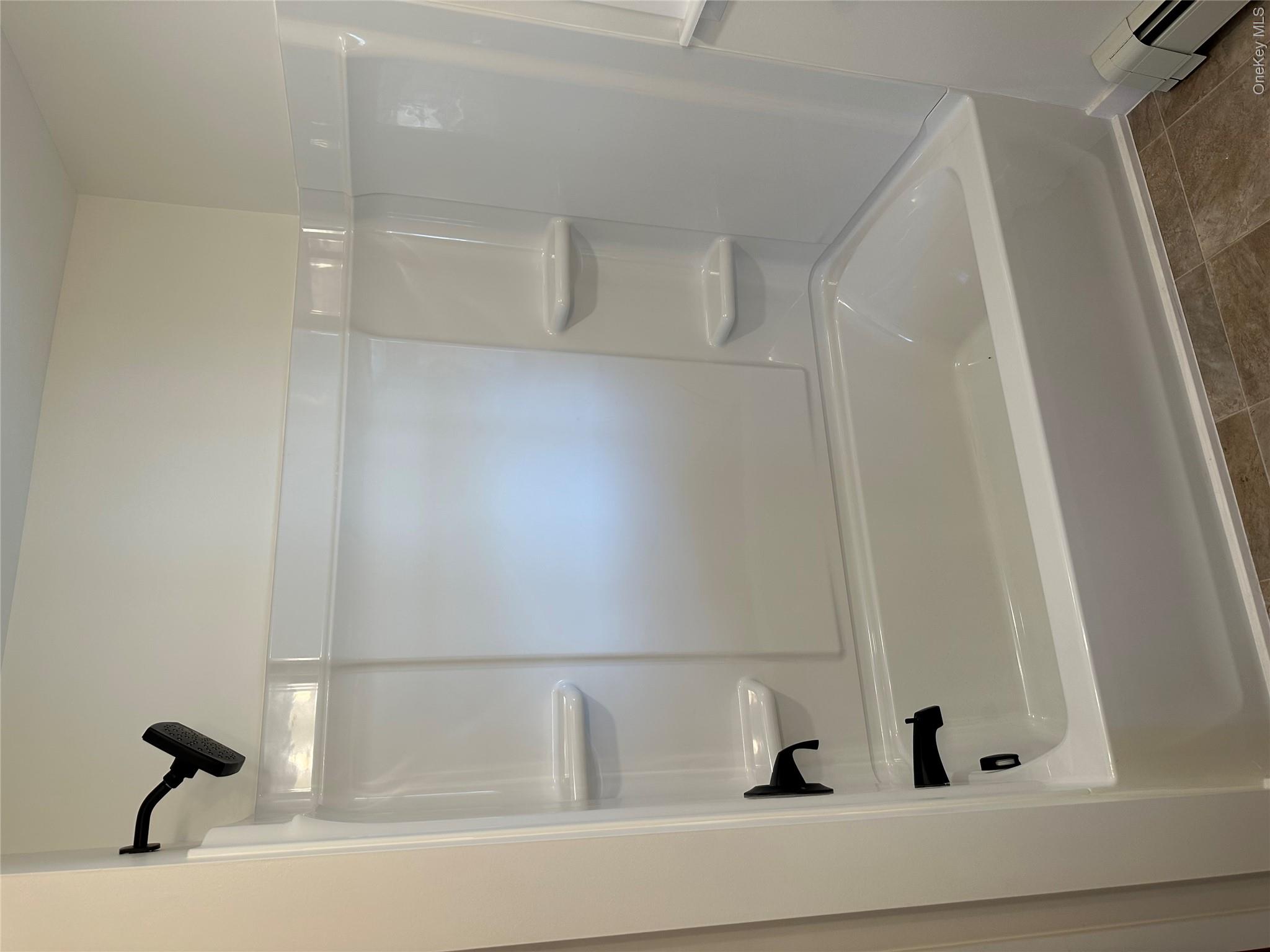 3 Indiana Road Goshen, NY 10924 - Photo 9 of 13 Clean crisp white bathroom with matte black fixtures
