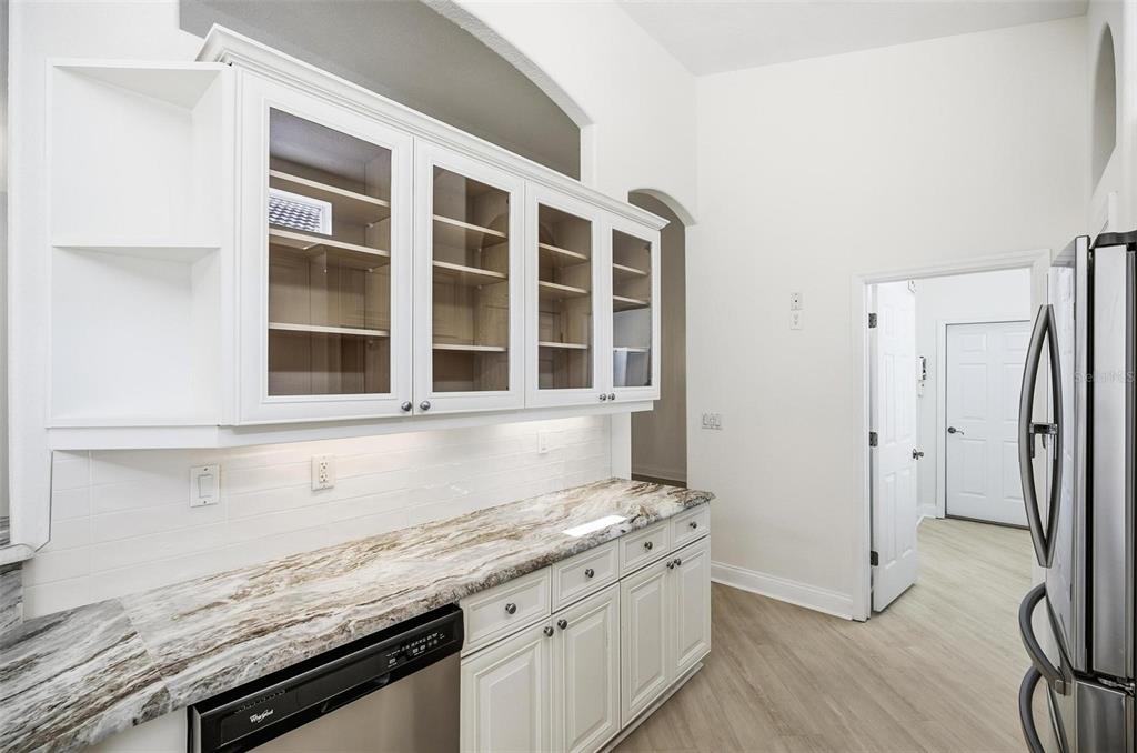 16 Village View Way Palm Coast, FL 32137 - Photo 18 of 89 a kitchen with granite countertop a sink and a stove
