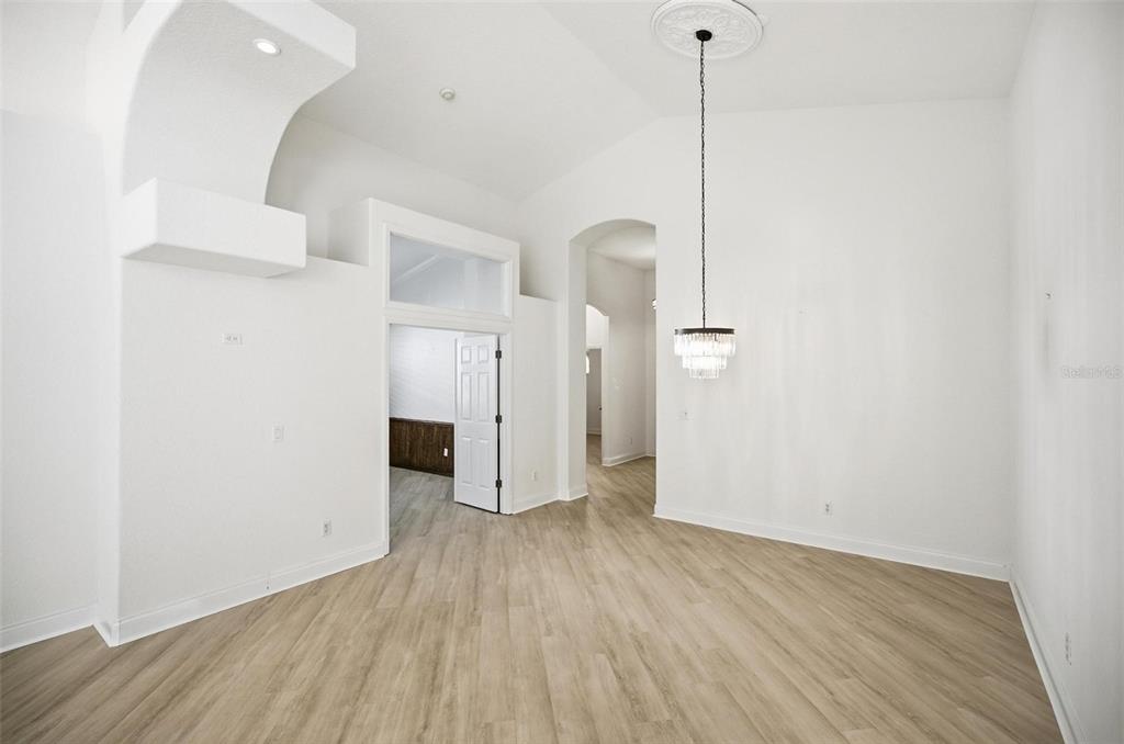 16 Village View Way Palm Coast, FL 32137 - Photo 24 of 89 a view of a room with wooden floor and white walls