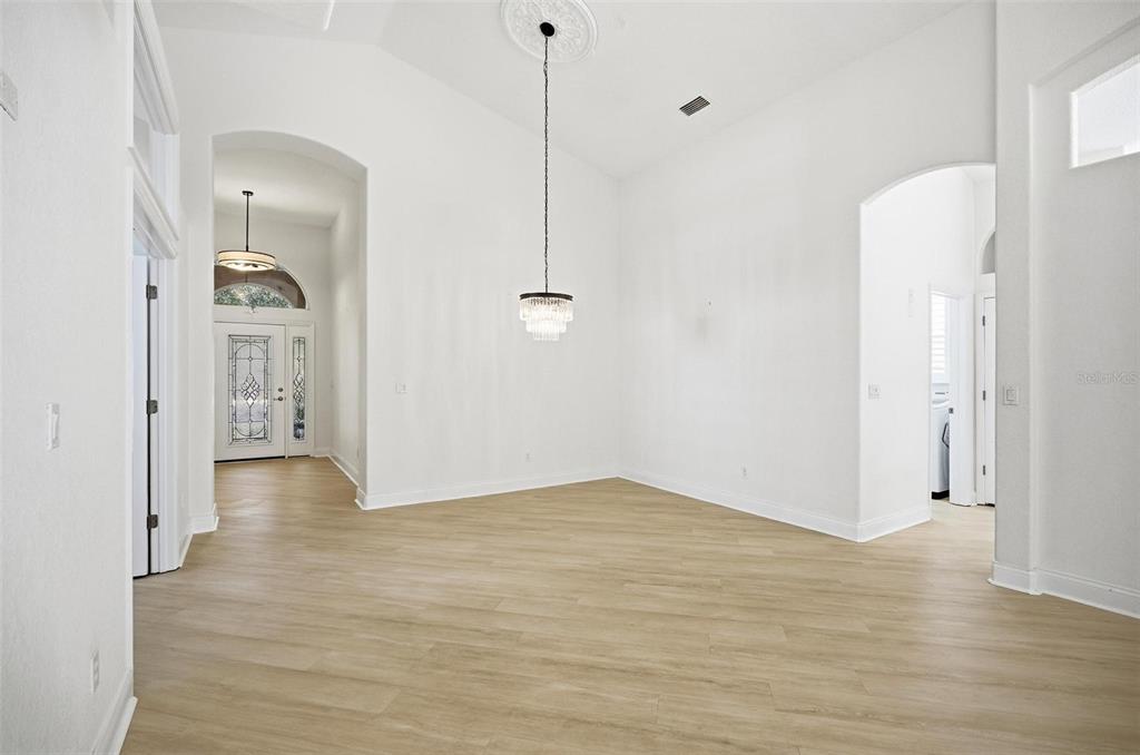 16 Village View Way Palm Coast, FL 32137 - Photo 25 of 89 a view of a hallway with wooden floor