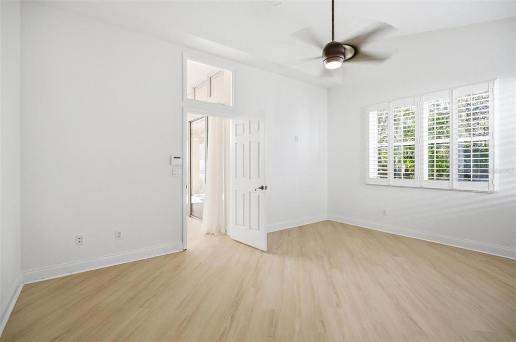 16 Village View Way Palm Coast, FL 32137 - Photo 30 of 89 wooden floor in an empty room with a window