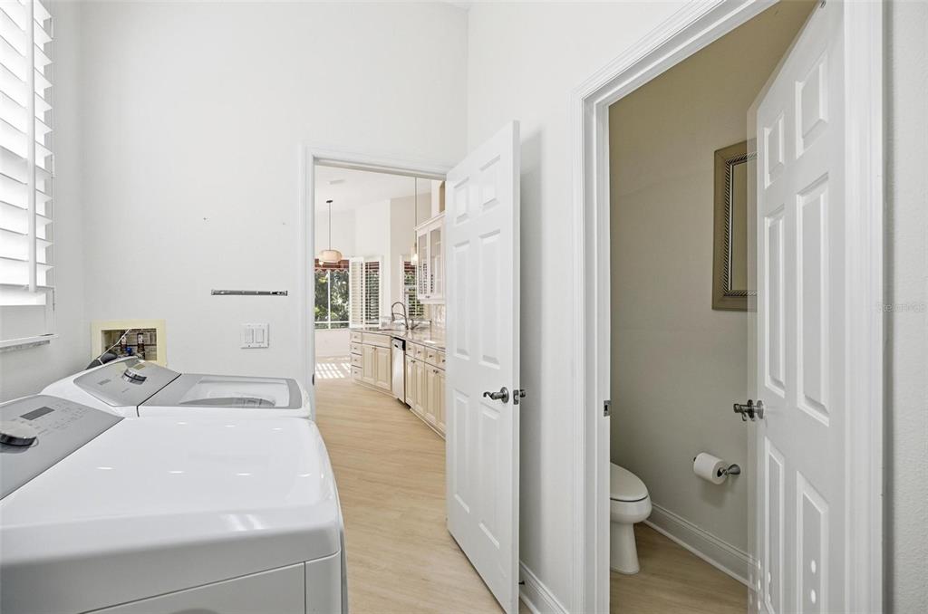 16 Village View Way Palm Coast, FL 32137 - Photo 50 of 89 a en suite bathroom with a sink a toilet and shower