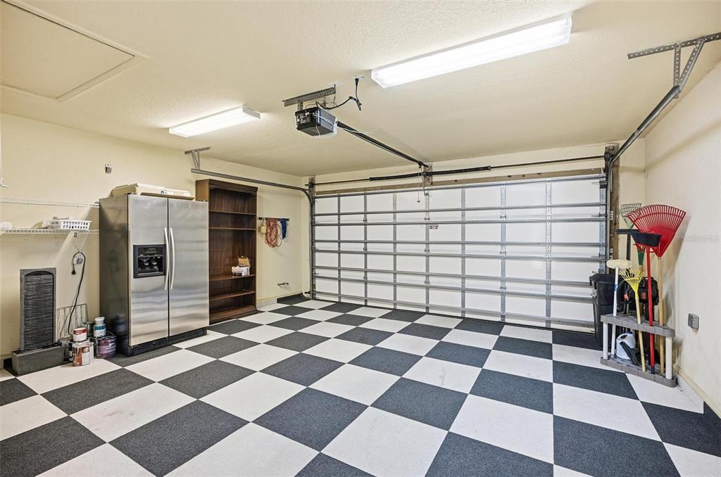 16 Village View Way Palm Coast, FL 32137 - Photo 52 of 89 a black and white checkered floor