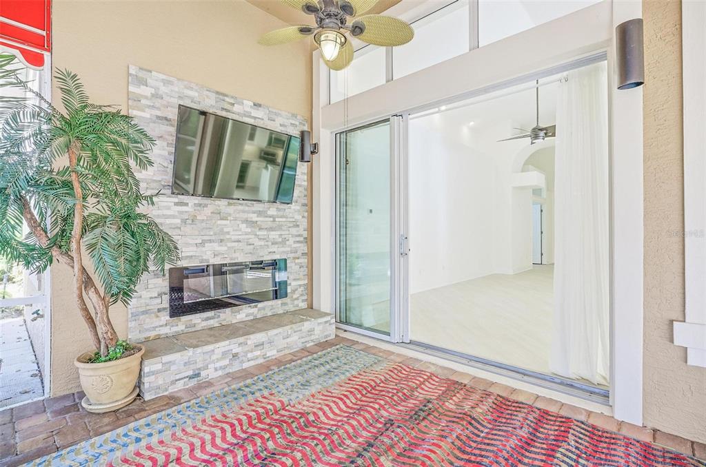 16 Village View Way Palm Coast, FL 32137 - Photo 56 of 89 a view of an entryway with a flower pot and a bookshelf