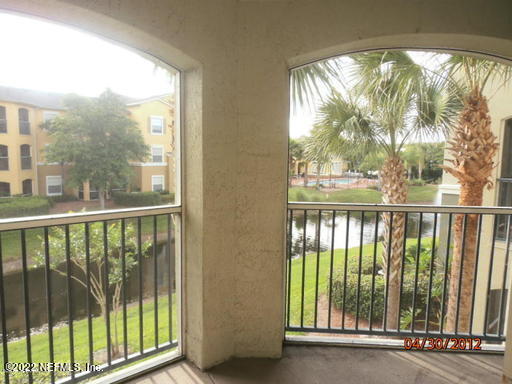 a view of a large window with an outdoor space