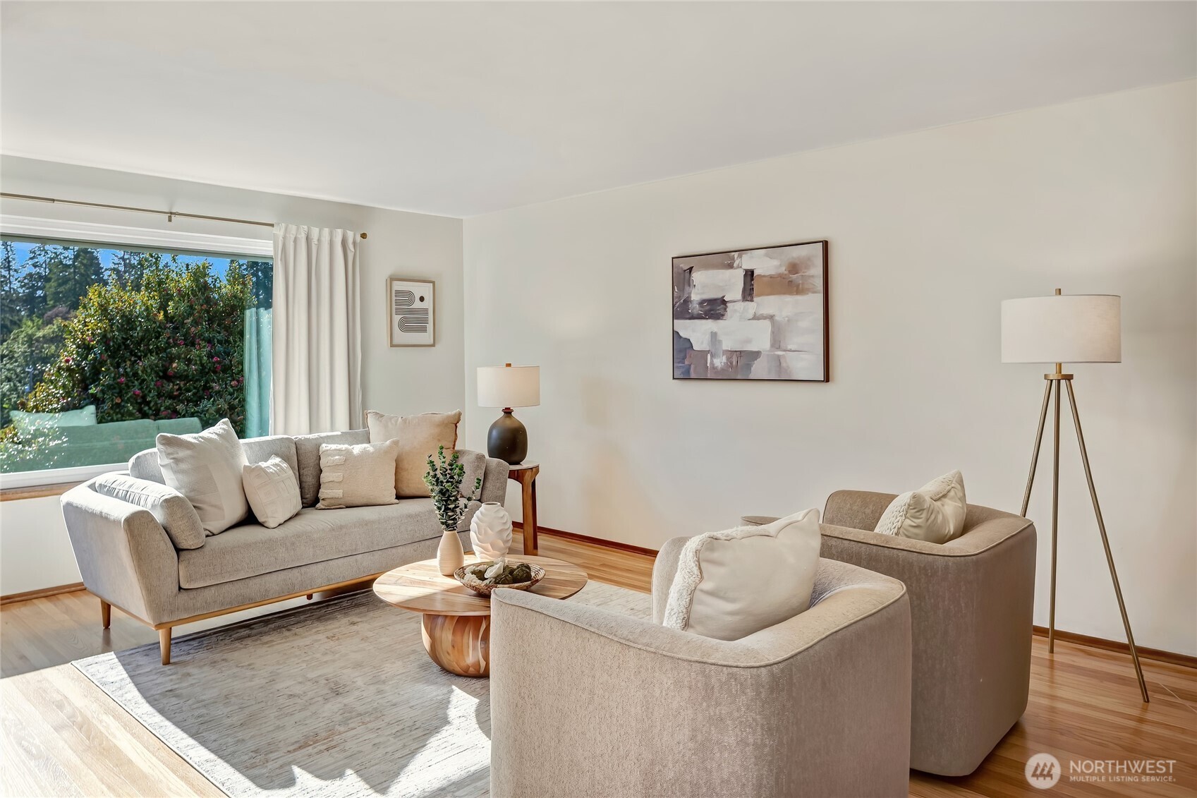 7571 45th Avenue Southwest Seattle, WA 98136 - Photo 5 of 40 a living room with furniture and a large window
