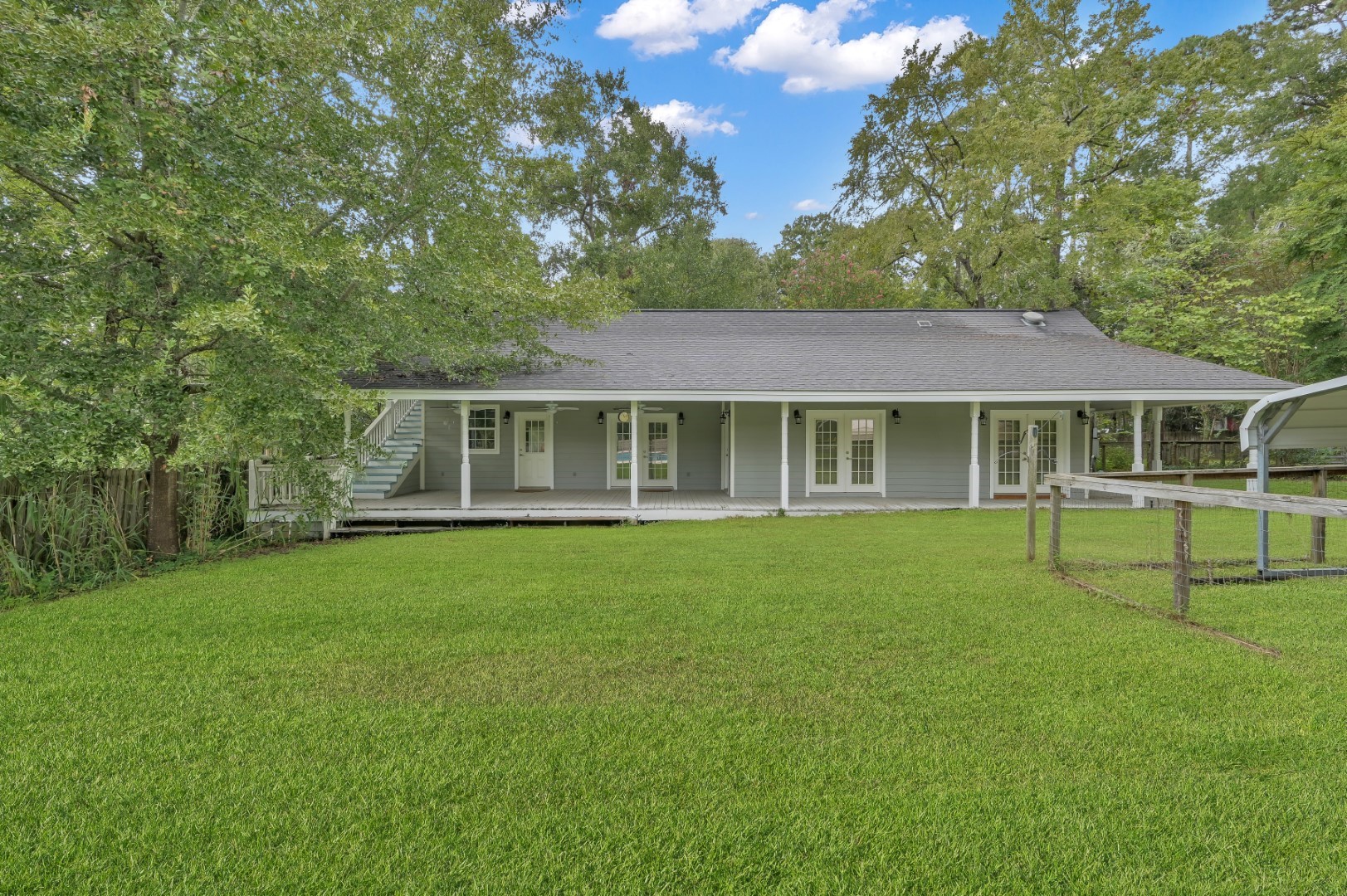 641 Red Clover Livingston, TX 77351 - Photo 20 of 50 Pool House Porch has a grassy area so spectators can watch the football game or swimmers.