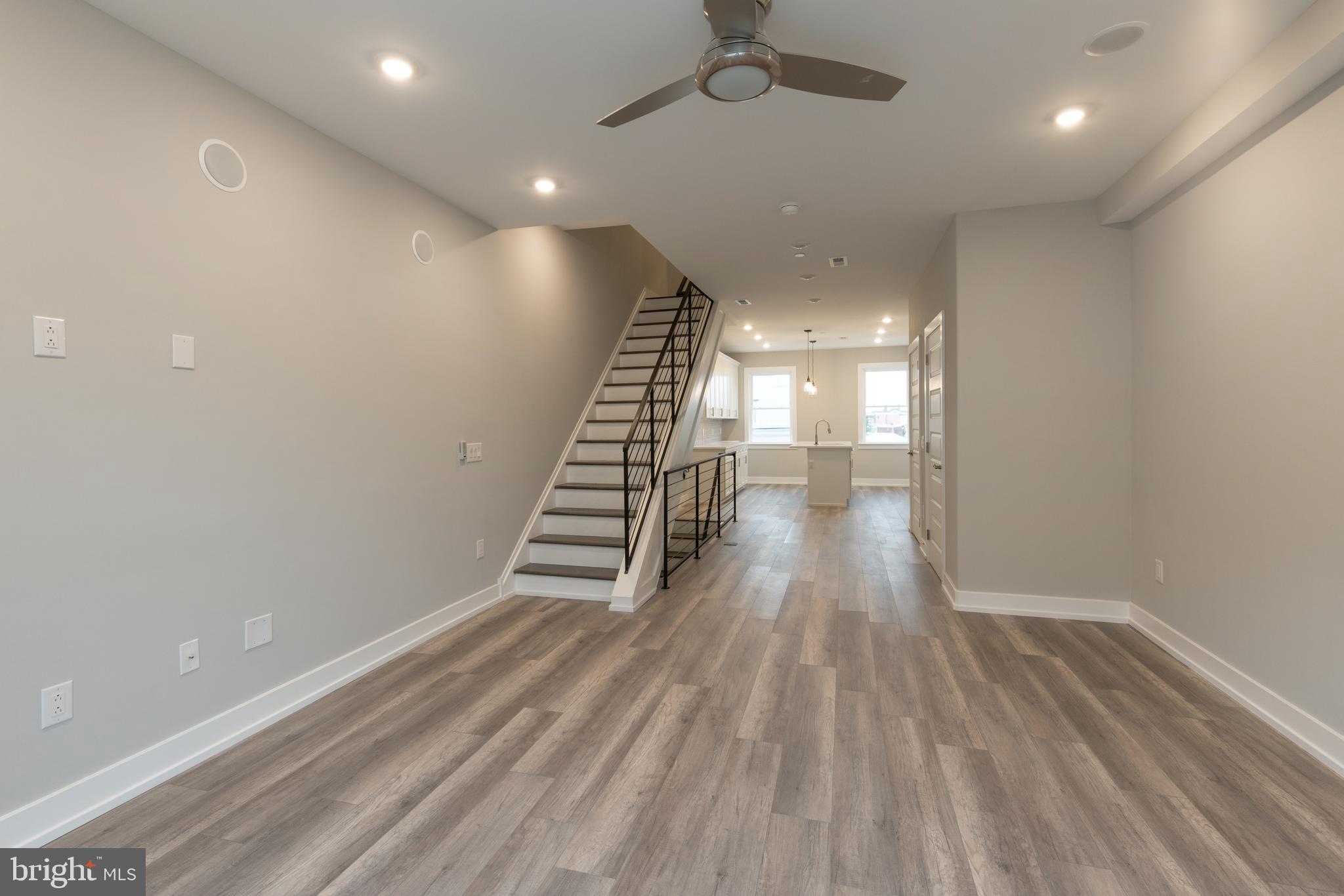 139 West Huntingdon Street, Unit 2 Philadelphia, PA 19133 - Photo 8 of 29 wooden floor in an empty room with a window
