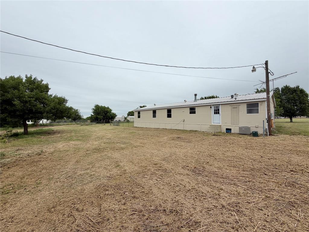 9721 Limestone Joshua, TX 76058 - Photo 34 of 36 a view of a house with a backyard