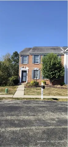 a kitchen that has a sink and a stove in it