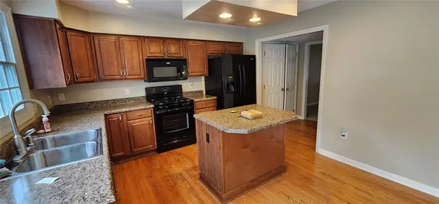 a view of a kitchen from the hallway