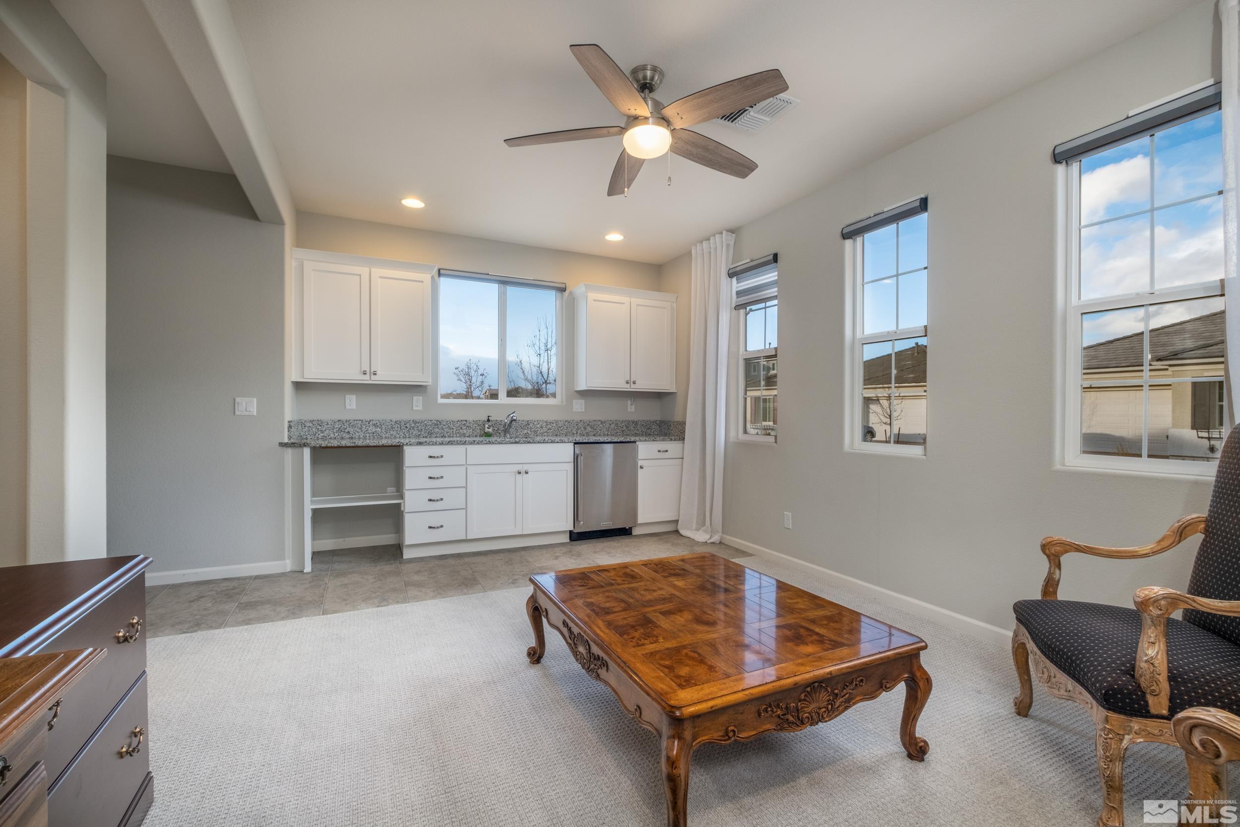 2960 Ethelinda Way Reno, NV 89521 - Photo 14 of 40 a living room with furniture and kitchen view