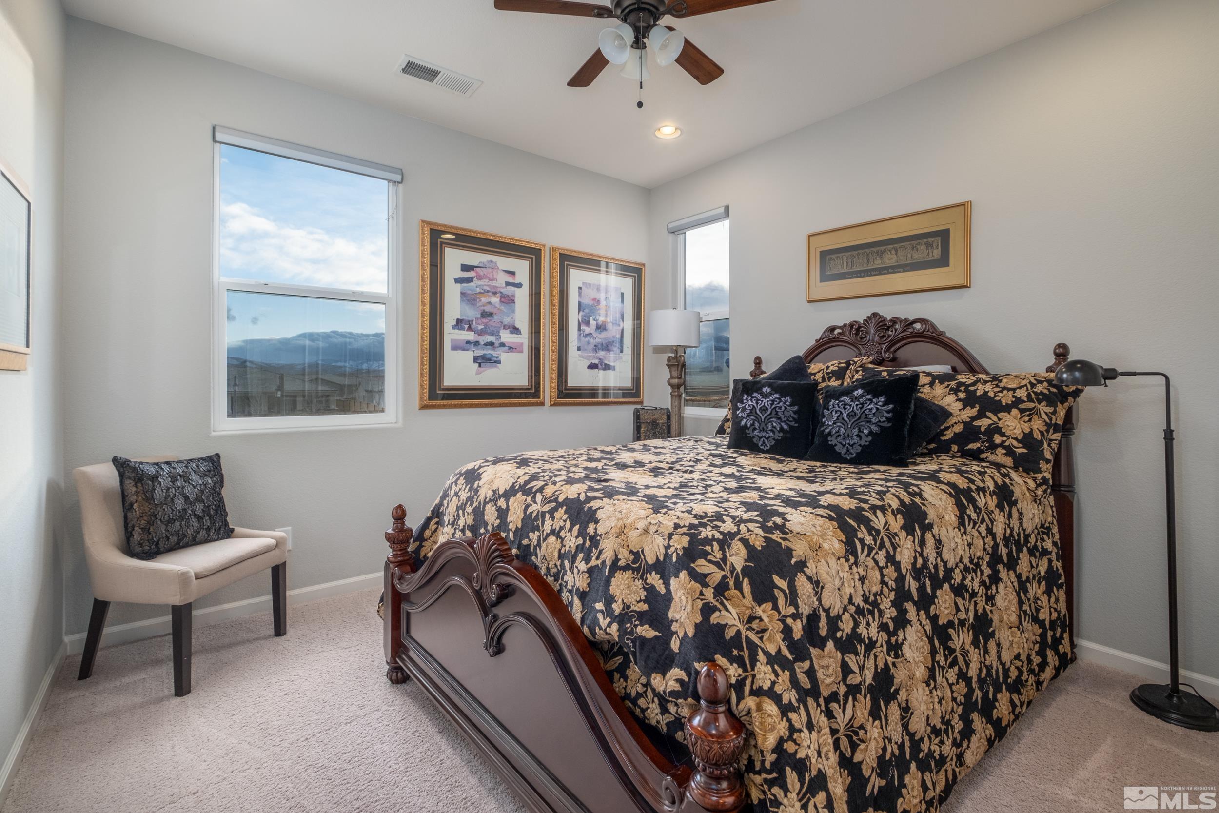2960 Ethelinda Way Reno, NV 89521 - Photo 28 of 40 a bedroom with a bed and window