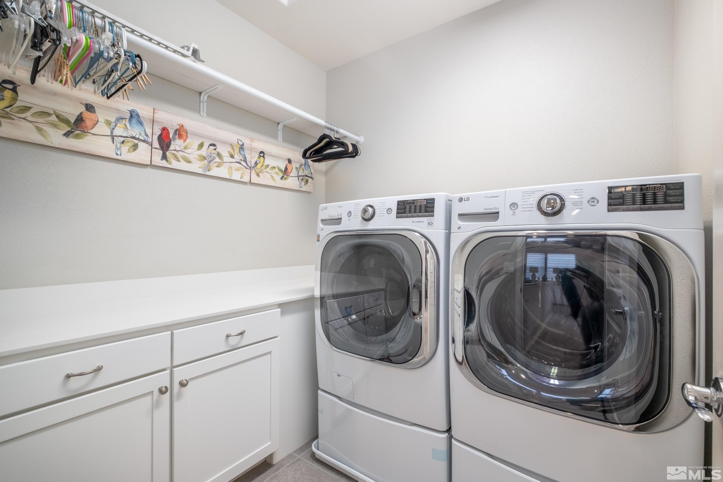 2960 Ethelinda Way Reno, NV 89521 - Photo 31 of 40 a utility room with dryer and washer