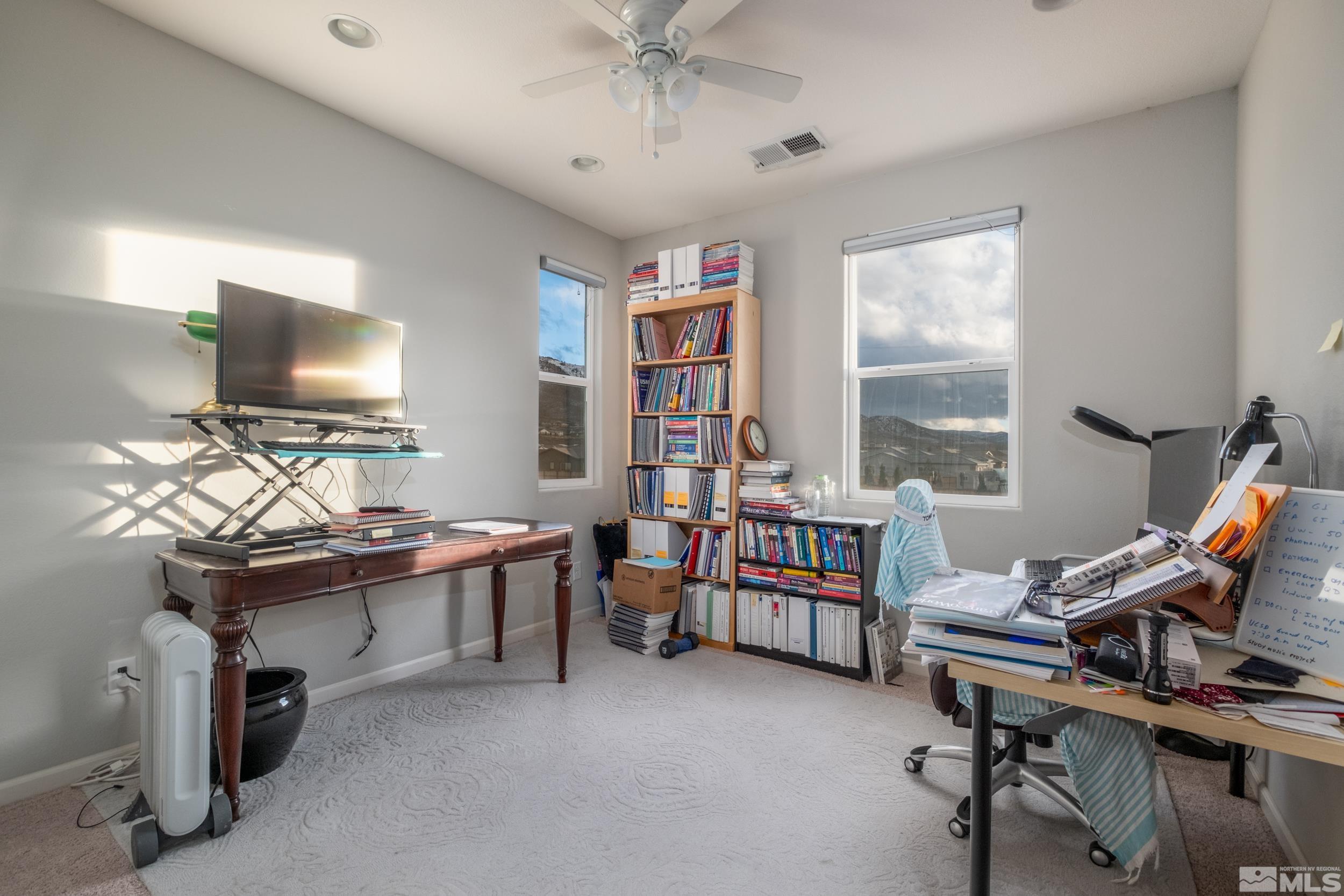 2960 Ethelinda Way Reno, NV 89521 - Photo 32 of 40 a view of a workspace with furniture and a window