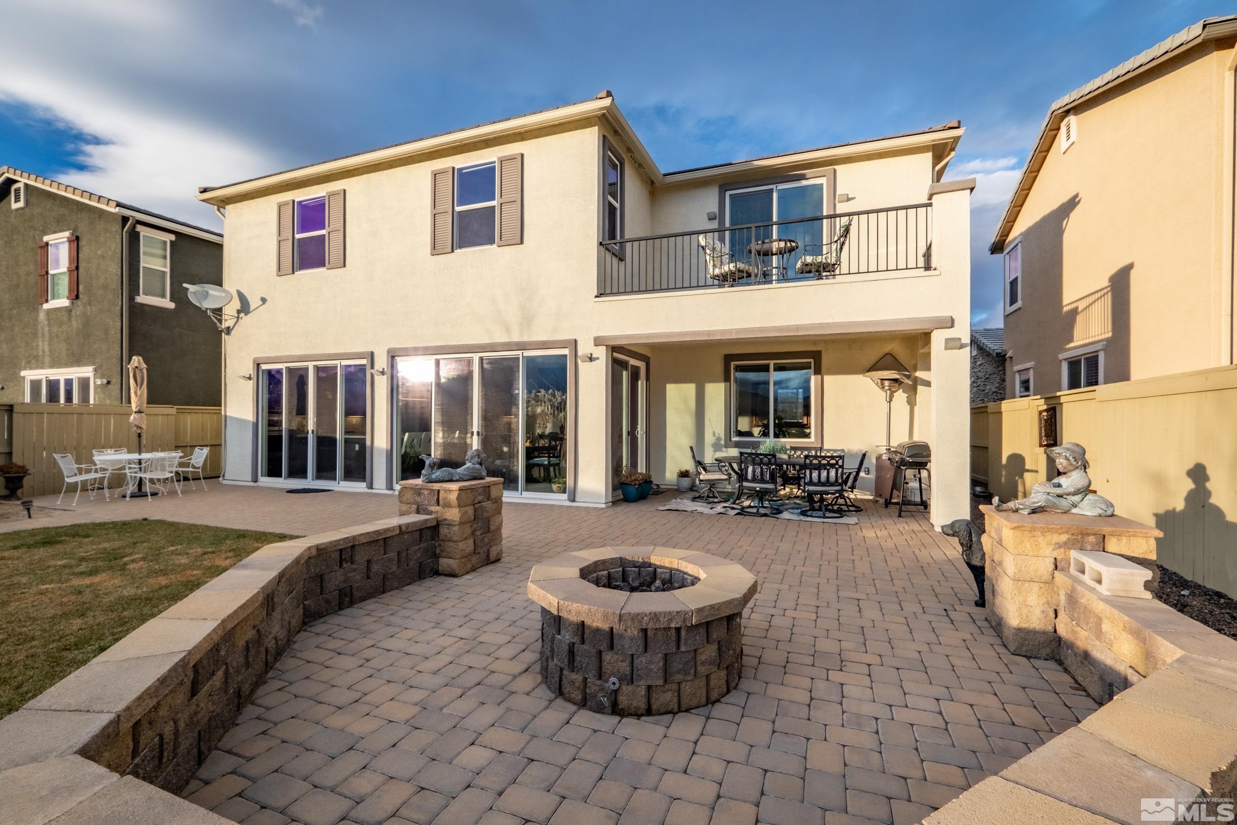 2960 Ethelinda Way Reno, NV 89521 - Photo 36 of 40 a view of a house with backyard porch and patio