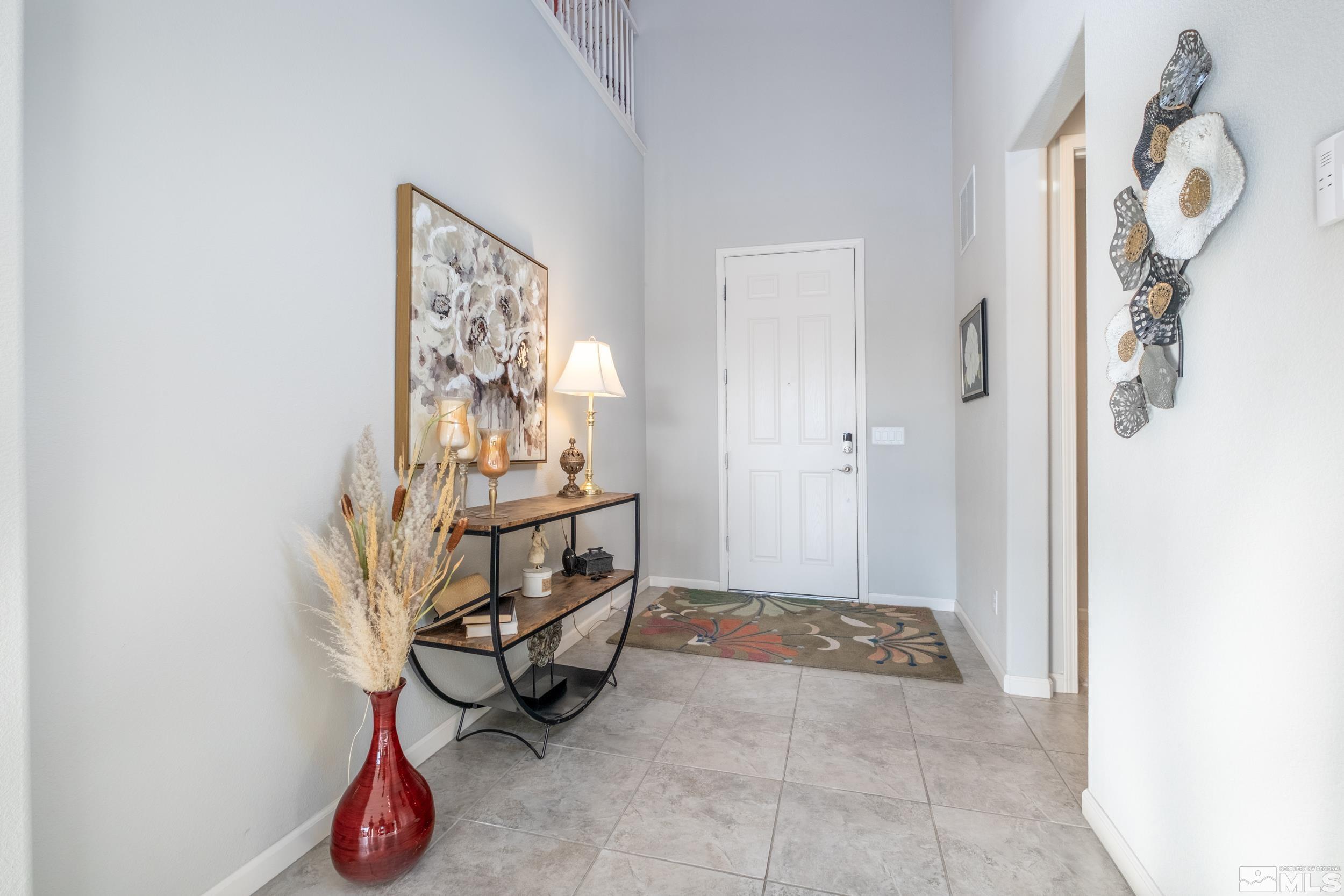 2960 Ethelinda Way Reno, NV 89521 - Photo 5 of 40 a view of an entryway with wooden floor