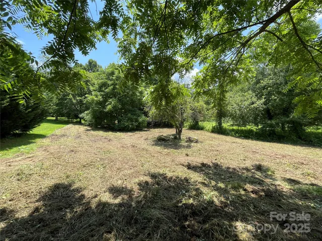 a view of a backyard of a house