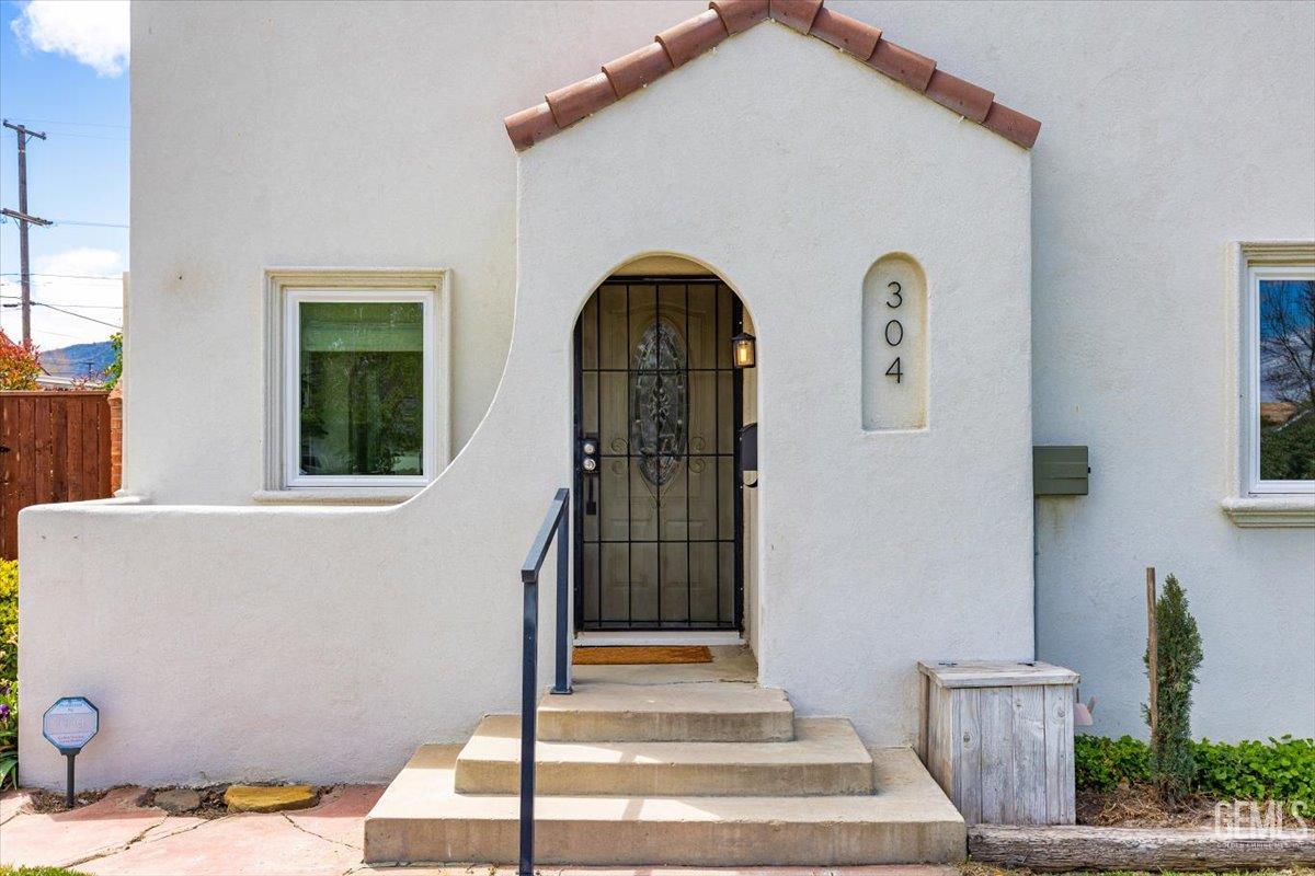 Undisclosed Address Tehachapi, CA 93561 - Photo 3 of 46 a front view of a house with a porch