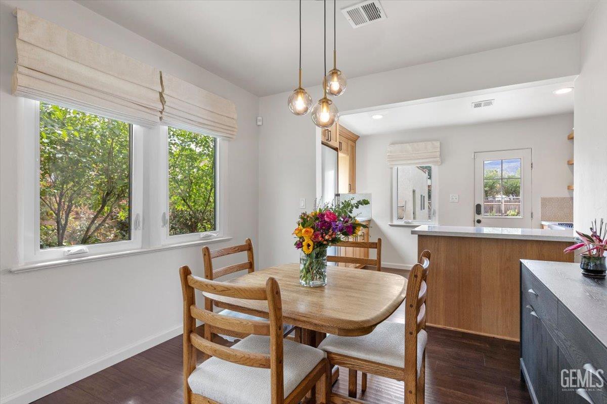 Undisclosed Address Tehachapi, CA 93561 - Photo 10 of 46 a view of a dining room with furniture window and wooden floor