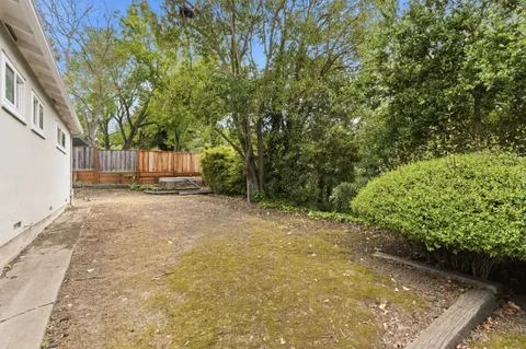 a view of backyard with green space