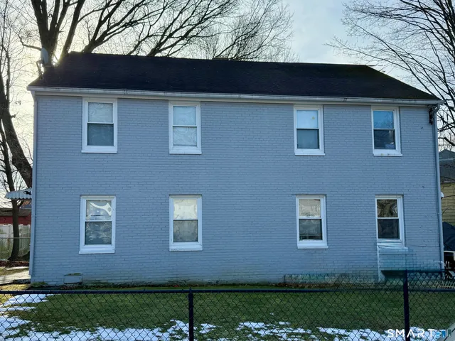 a view front of house with a yard
