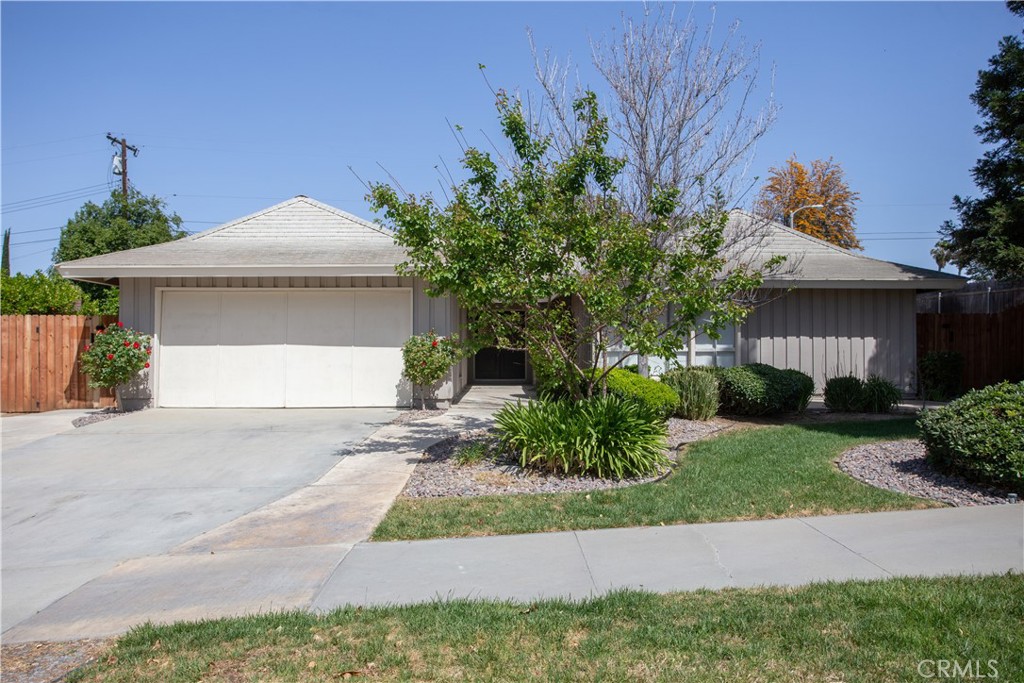 6180 Academy Avenue Riverside, CA 92506 - Photo 1 of 1 a front view of a house with garden